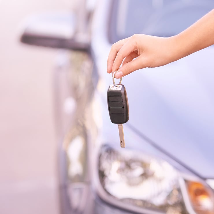 Hand Holding Car Keys 